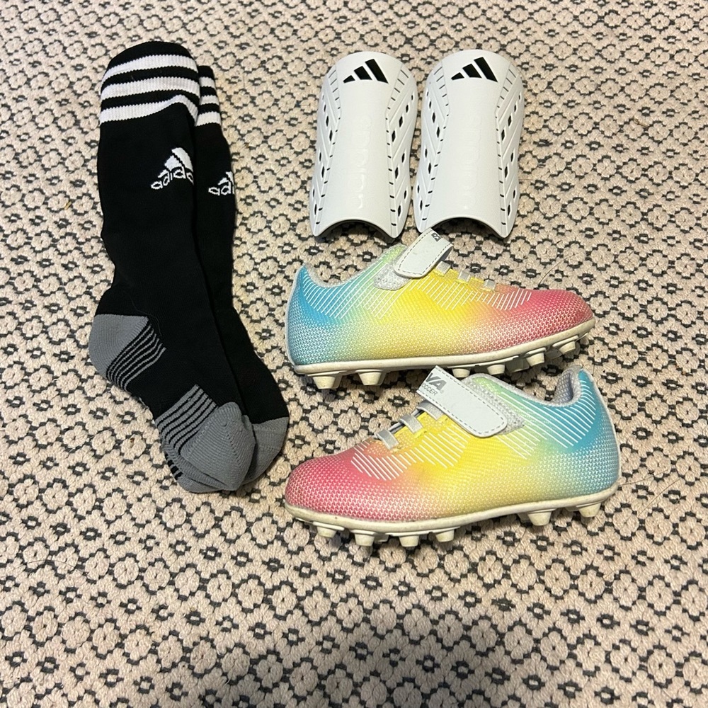Toddler soccer cleats, shin guards, and socks